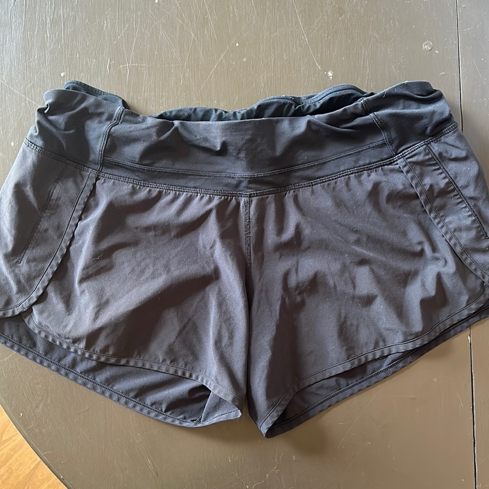 Black Lululemon Speed Up Shorts 4 inch SIZE 12